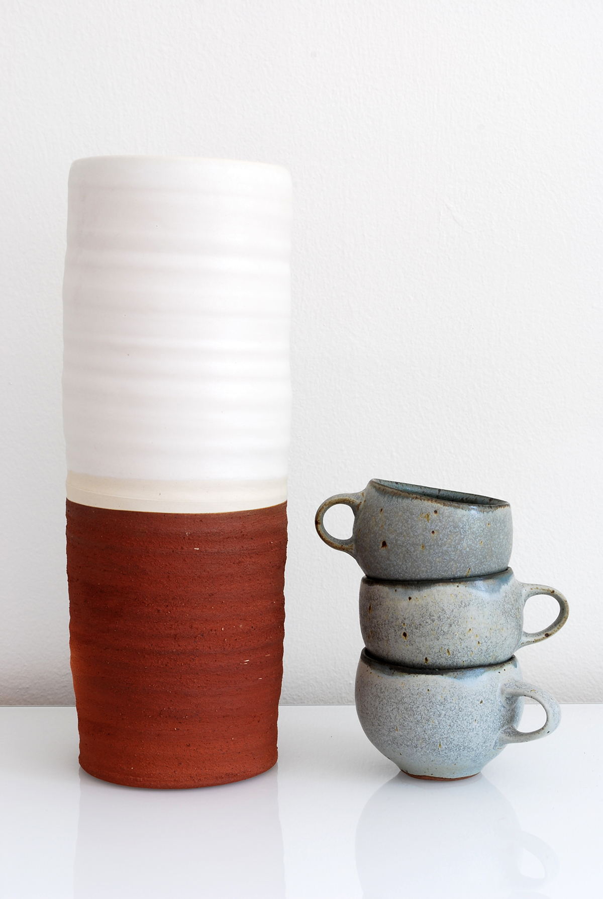 a10_mdba_mdby_manufactured_ceramics_wood_concrete_sculptures_phil_finder_red_white_cups